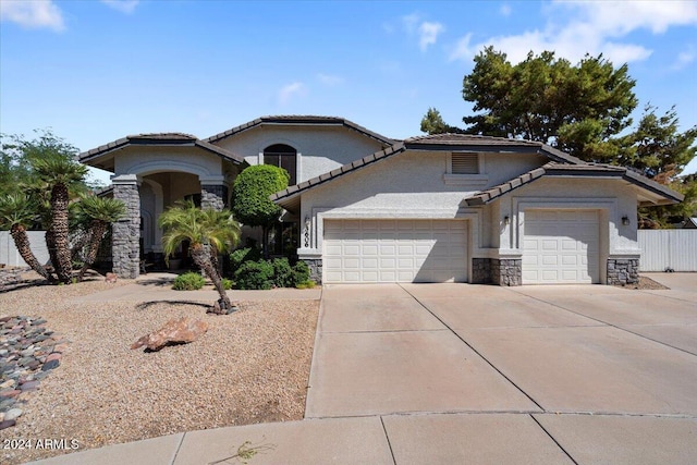 view of front of home with a garage