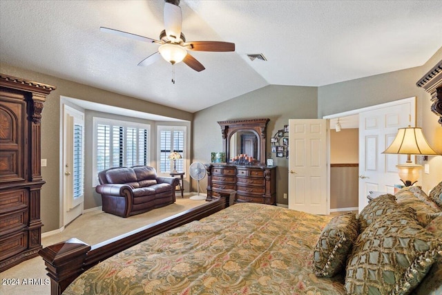 carpeted bedroom with ceiling fan, a textured ceiling, access to outside, and vaulted ceiling