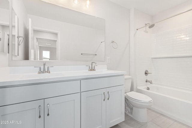 full bathroom featuring tile patterned floors, vanity, toilet, and tub / shower combination