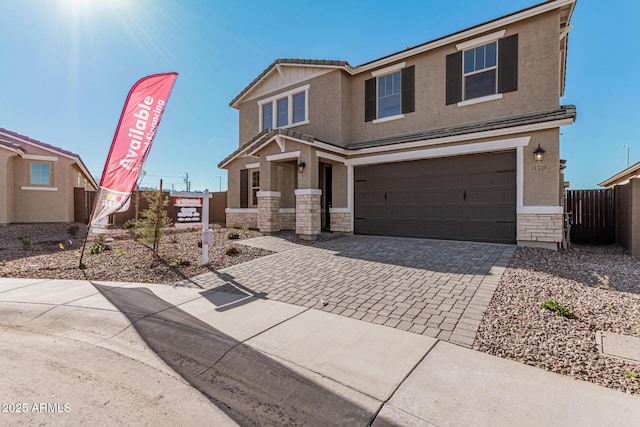 view of front of home with a garage