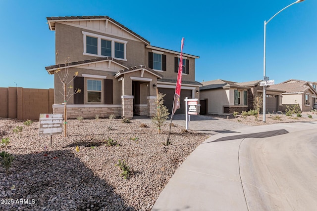 view of front of property with a garage