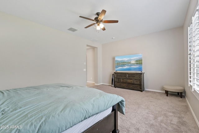bedroom featuring carpet floors, ceiling fan, baseboards, and visible vents