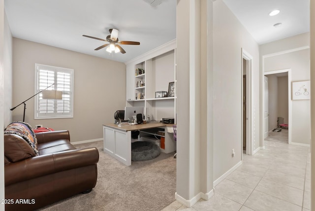 office area featuring a ceiling fan, baseboards, and visible vents