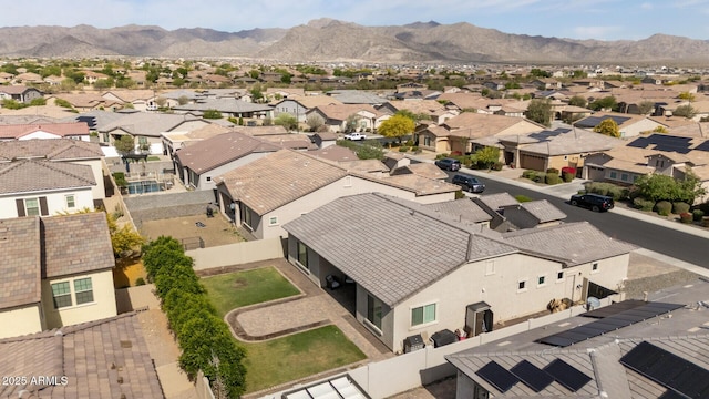 birds eye view of property featuring a residential view and a mountain view