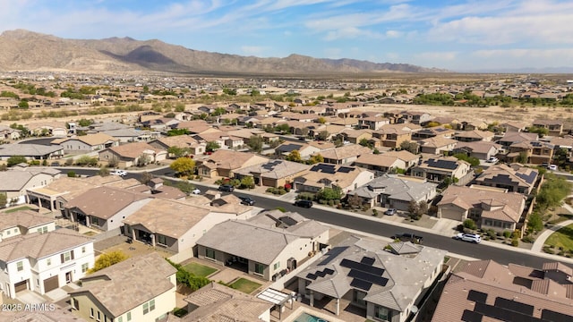 drone / aerial view with a residential view and a mountain view