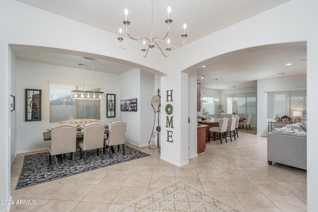 dining area featuring light tile patterned flooring