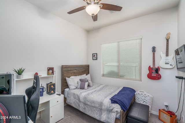 carpeted bedroom with ceiling fan