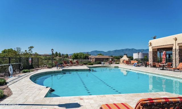 4968 E Meadow Vista Dr, Cornville, AZ 86325 - community pool with fence, a patio area, and a mountain view