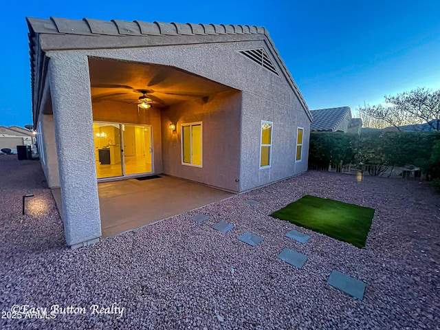 4968 E Meadow Vista Dr, Cornville, AZ 86325 - back of house featuring stucco siding, a patio, and ceiling fan