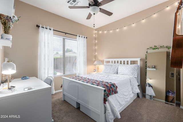 carpeted bedroom with ceiling fan