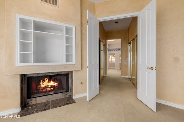 hallway featuring carpet floors