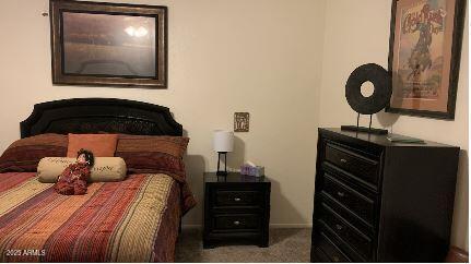 bedroom featuring carpet flooring