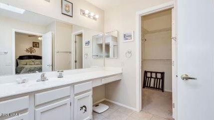 bathroom featuring vanity and tile patterned flooring