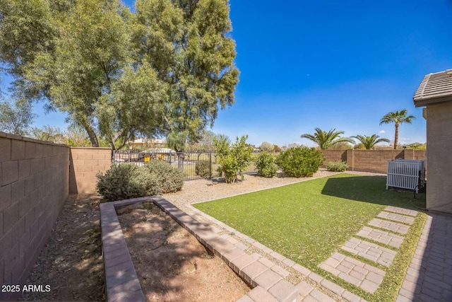 view of yard featuring a fenced backyard