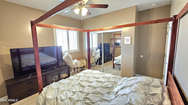 bedroom featuring a closet and a ceiling fan