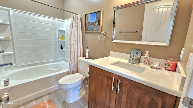 bathroom featuring toilet, vanity, and shower / bath combo