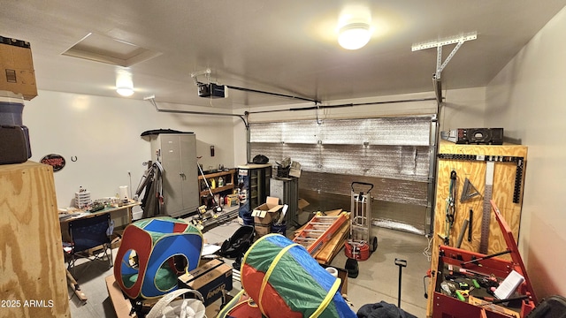 garage featuring a garage door opener