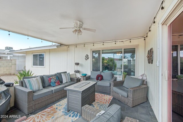 view of patio / terrace with ceiling fan and an outdoor hangout area