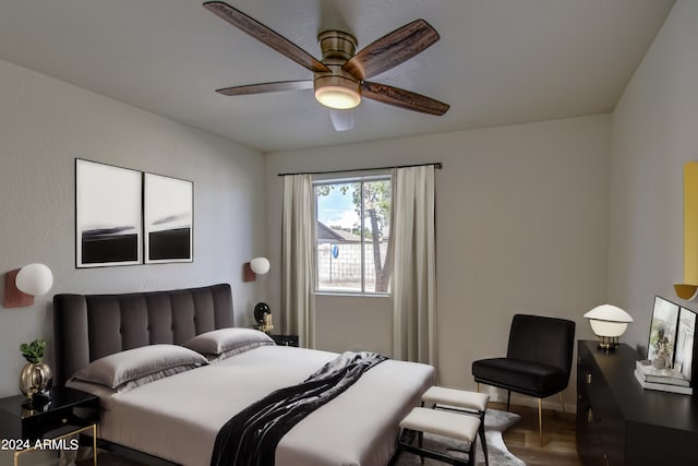 bedroom with hardwood / wood-style floors and ceiling fan