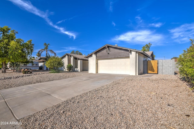 ranch-style home with a garage