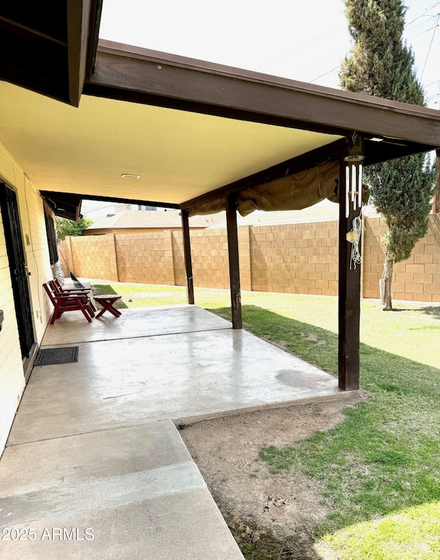 view of patio with a fenced backyard