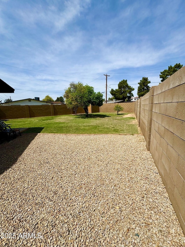 view of yard with fence