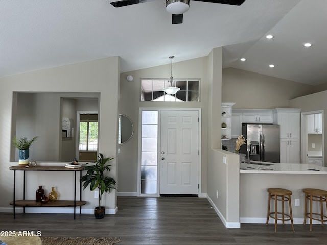 15075 W Amelia Dr, Goodyear, AZ 85395 - foyer with a ceiling fan, dark wood-style flooring, recessed lighting, and high vaulted ceiling