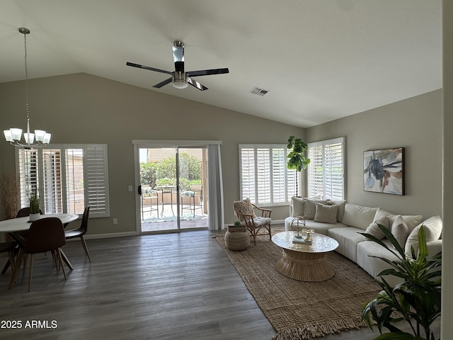 15075 W Amelia Dr, Goodyear, AZ 85395 - living area featuring a chandelier, vaulted ceiling, wood finished floors, and ceiling fan