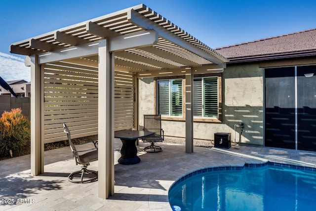 view of swimming pool with a pergola and a patio