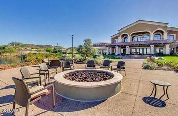 exterior space featuring an outdoor fire pit