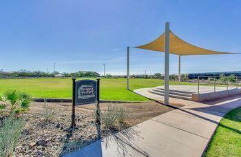 view of property's community featuring a yard