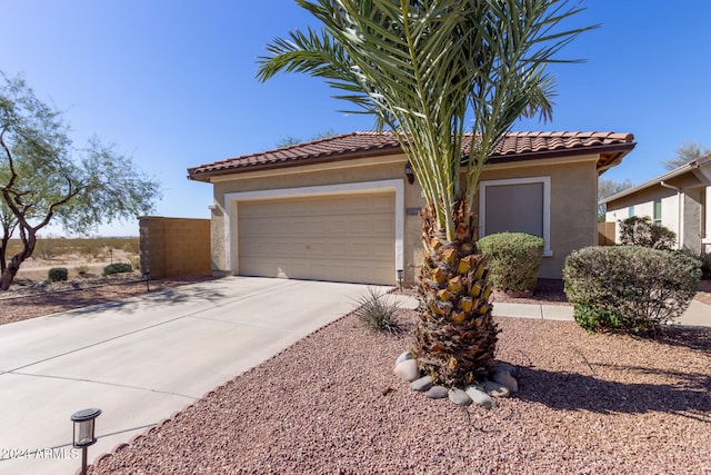 view of front of property featuring a garage