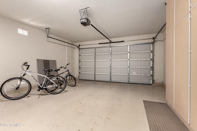 garage featuring a garage door opener