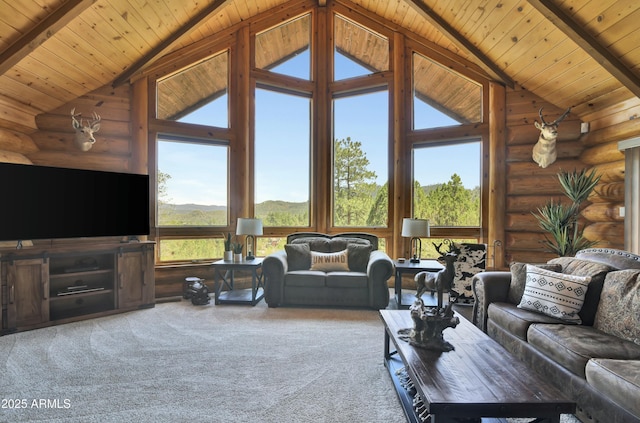 carpeted living room with beam ceiling, high vaulted ceiling, and wooden ceiling