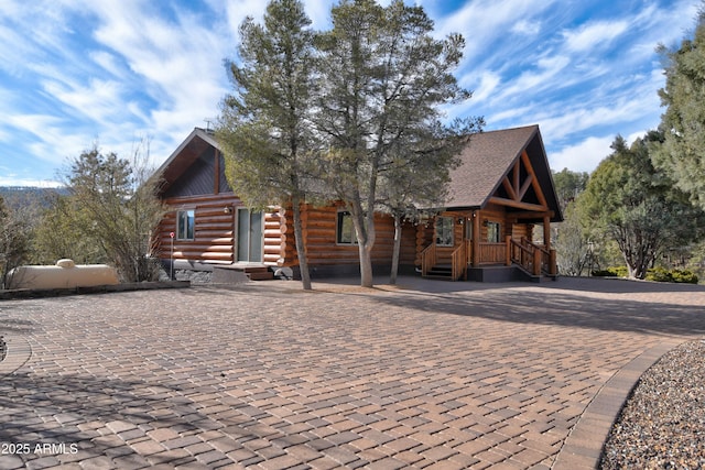 view of log-style house