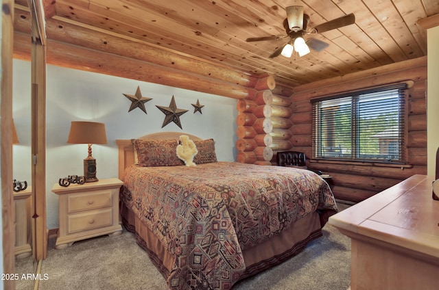 bedroom with wood ceiling, light colored carpet, rustic walls, and ceiling fan