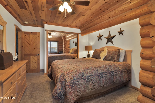 carpeted bedroom with wood ceiling, rustic walls, and ceiling fan