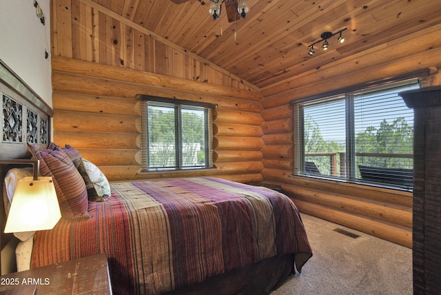 bedroom with lofted ceiling, carpet flooring, log walls, and wood ceiling