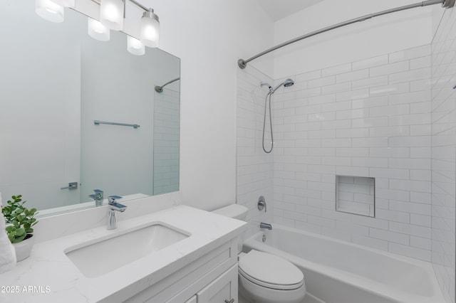 full bathroom featuring shower / bathing tub combination, vanity, and toilet