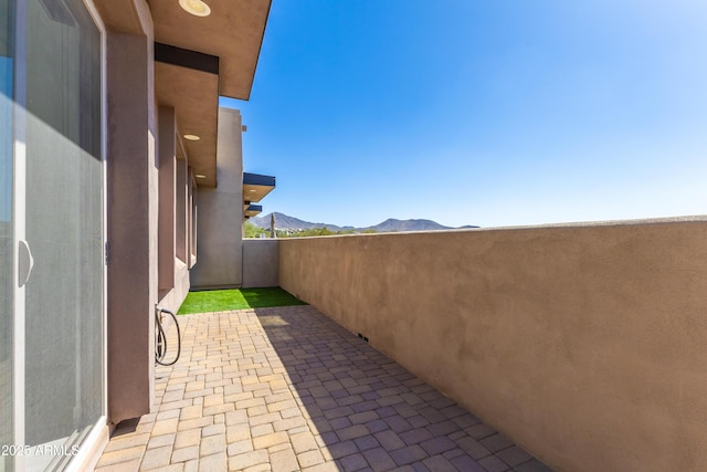 view of patio featuring a mountain view