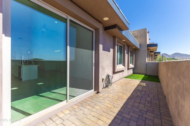 view of patio featuring a mountain view