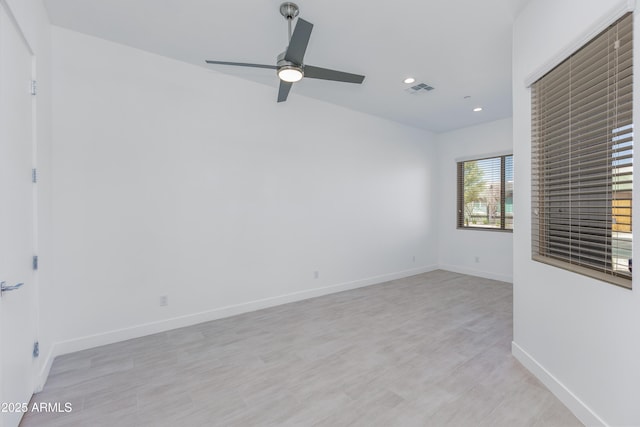 unfurnished room featuring visible vents, baseboards, a ceiling fan, light wood-type flooring, and recessed lighting