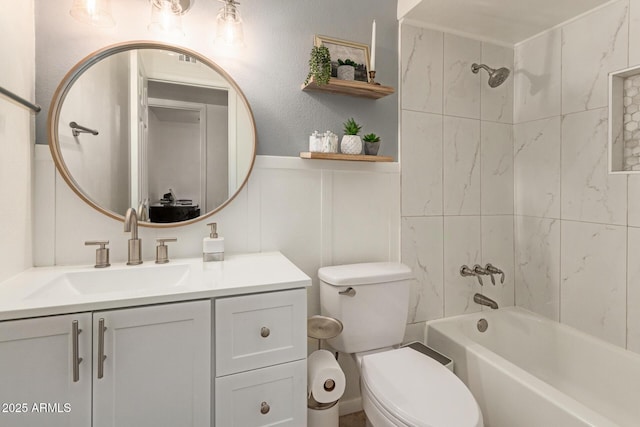 9825 N 44th Ave, Glendale, AZ 85302 - bathroom with vanity, shower / bathtub combination, a decorative wall, and a wainscoted wall