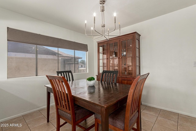 9825 N 44th Ave, Glendale, AZ 85302 - dining room featuring a chandelier and light tile patterned floors