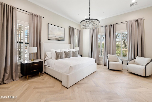 bedroom featuring crown molding, visible vents, and a chandelier