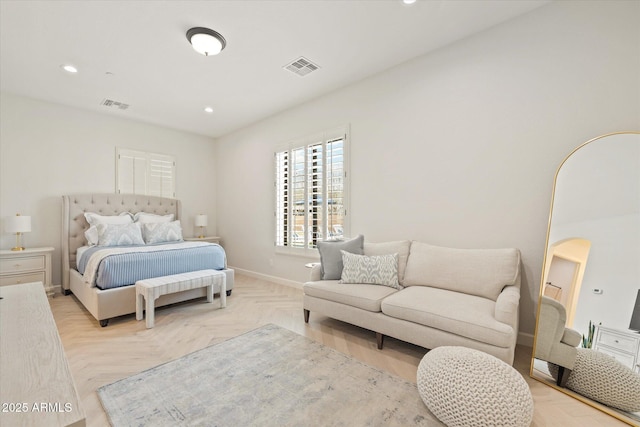 bedroom with arched walkways, recessed lighting, visible vents, and baseboards