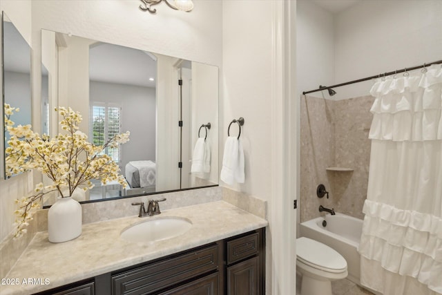 ensuite bathroom with vanity, ensuite bath, toilet, and shower / tub combo with curtain