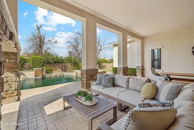 view of patio with a fenced in pool, outdoor lounge area, and a fenced backyard