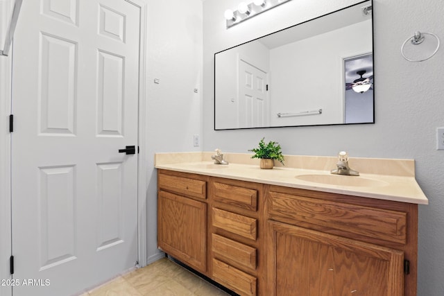 bathroom featuring double vanity and a sink