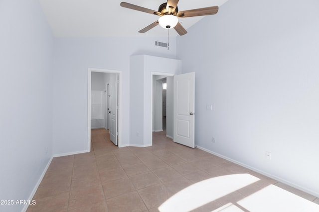 unfurnished bedroom featuring high vaulted ceiling, visible vents, baseboards, and light tile patterned floors